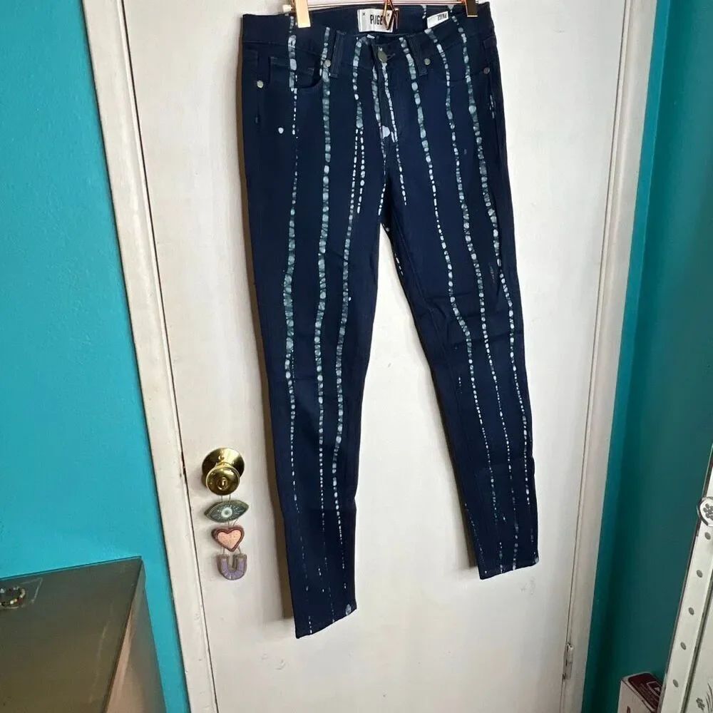 These are Paige Verdugo Ultra Skinny blue denim jeans with a stylish batik patte